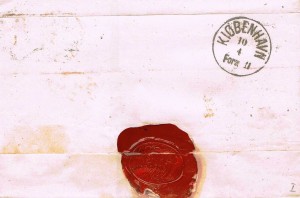 Bagsiden af brevet med ankomststemplet ANT V-3 3.7. Brugsperiode: 1861 – 1871.
