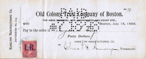 Check udstedt i Boston den 15. juli år 1898 No.79 af ”Old Colony Trust Company of Boston” påsat frimærke (GB Stanley Gibbons) 225a 2c rød (Washington) overtrykt med initialerne IR (Internal Revenue) for indenlandsk stempelmærke i afgift til finansiering af den Spansk-Amerikanske krig.